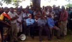 Governor Sir Arnold Amet and Provincial Administrator Joseph Dorpar listen to the crowd